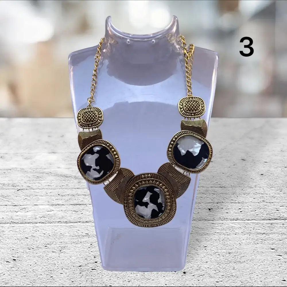 black and golden necklace