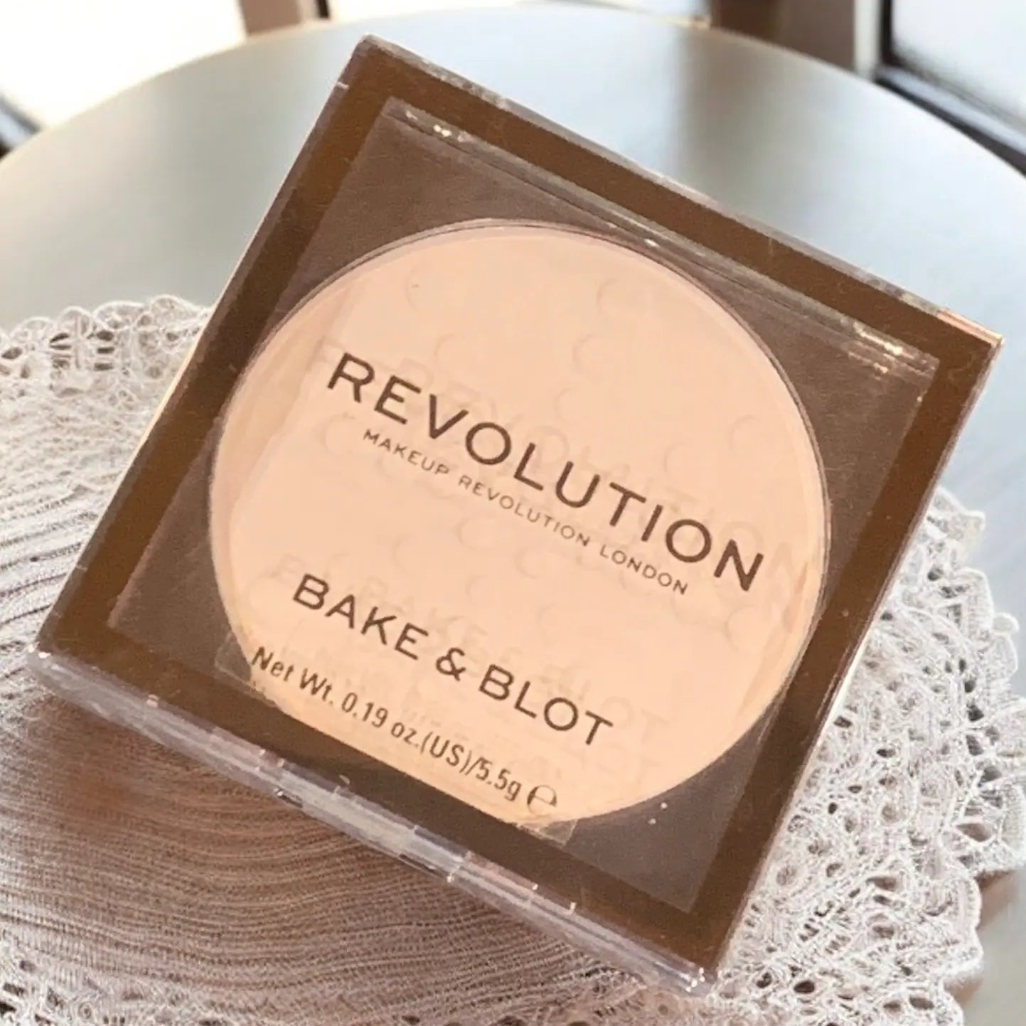 revolution bake and blot lace compact