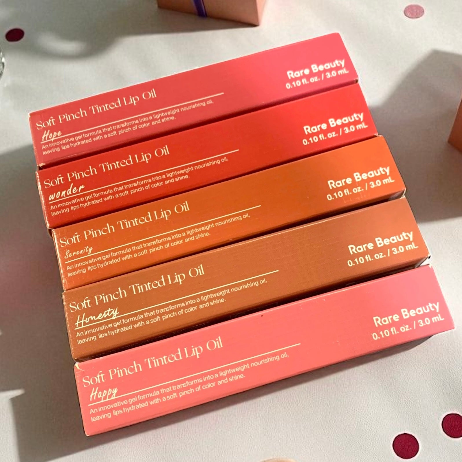 rare beauty lip oil
